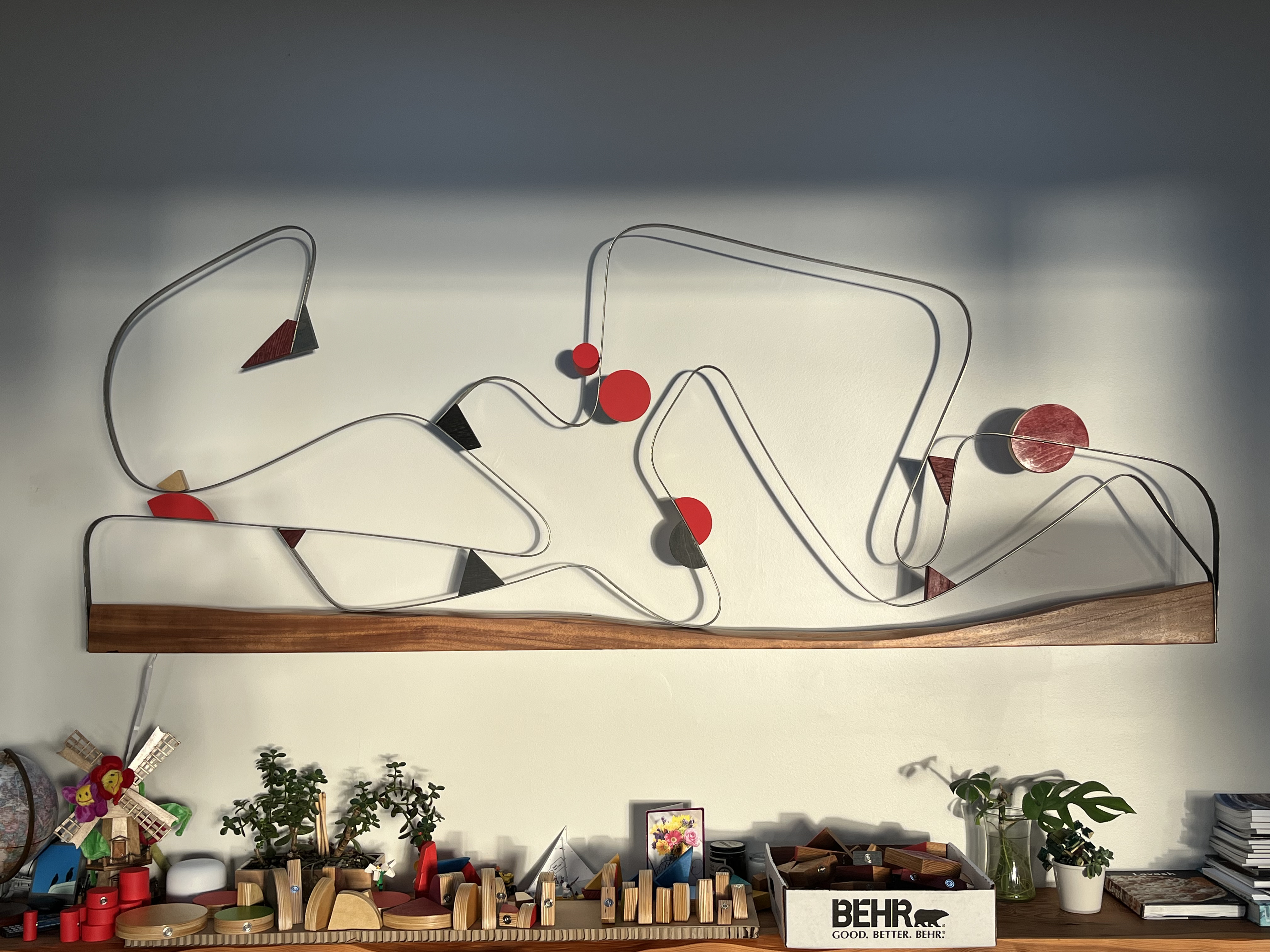 Interior line drawing in steel, walnut ledge