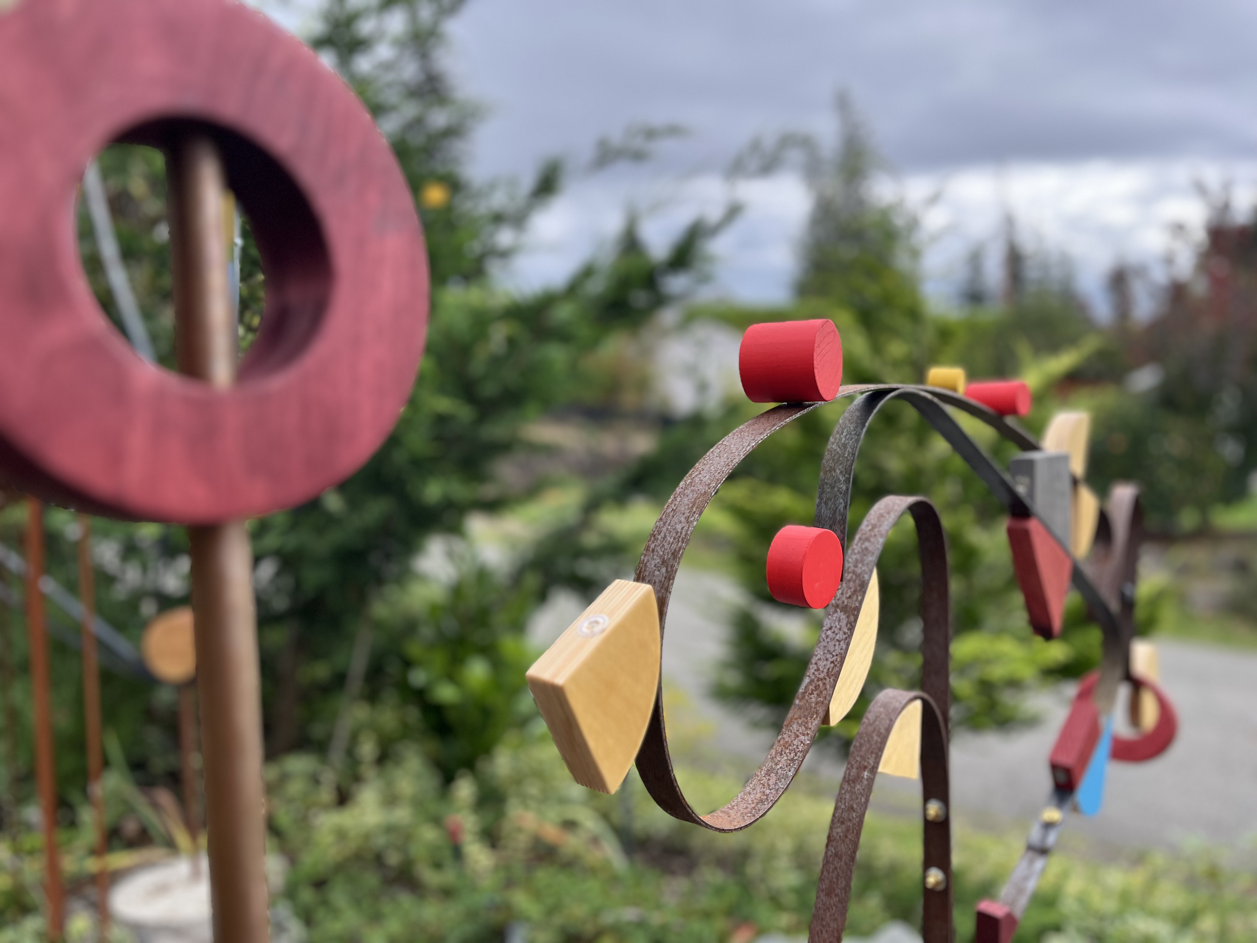 Detail — turned discs and weathered strap steel